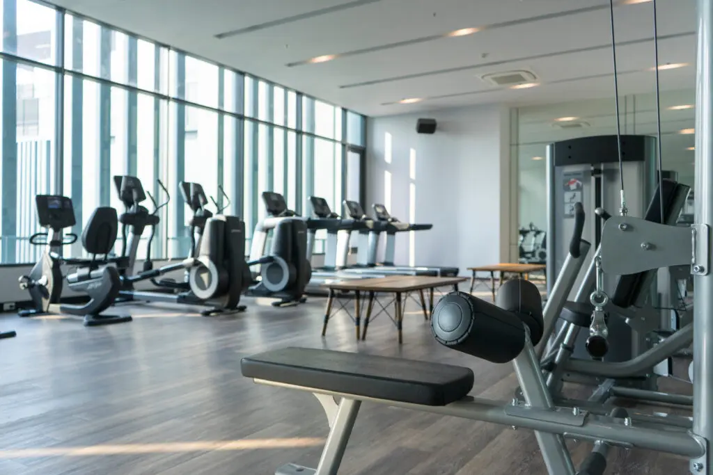 View of fitness room with many exercise equipment installed